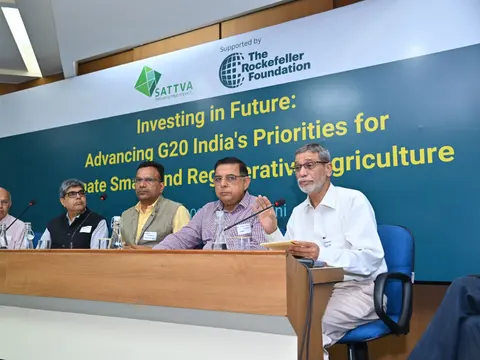 Siraj Hussain speaking at a panel table at the Investing in Future event supported by The Rockefeller Foundation
